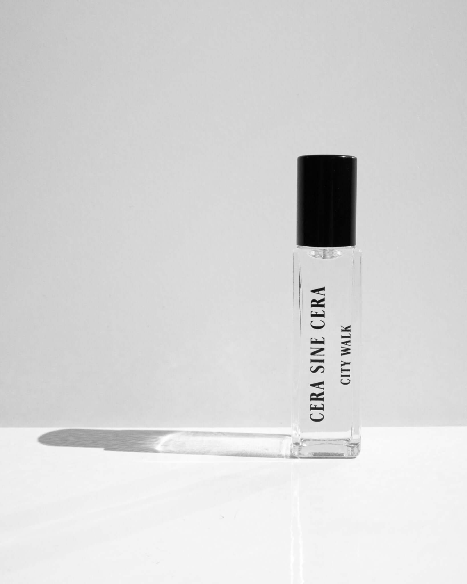 City Walk Perfume Oil - 10ml roll-on by Cera Sine Cera, fragrance notes of Black Currant/Vanilla/Patchouli. Scent of Soft Powdery Aromatic. Non-alcoholic, non-toxic, Vegan, and cruelty free.