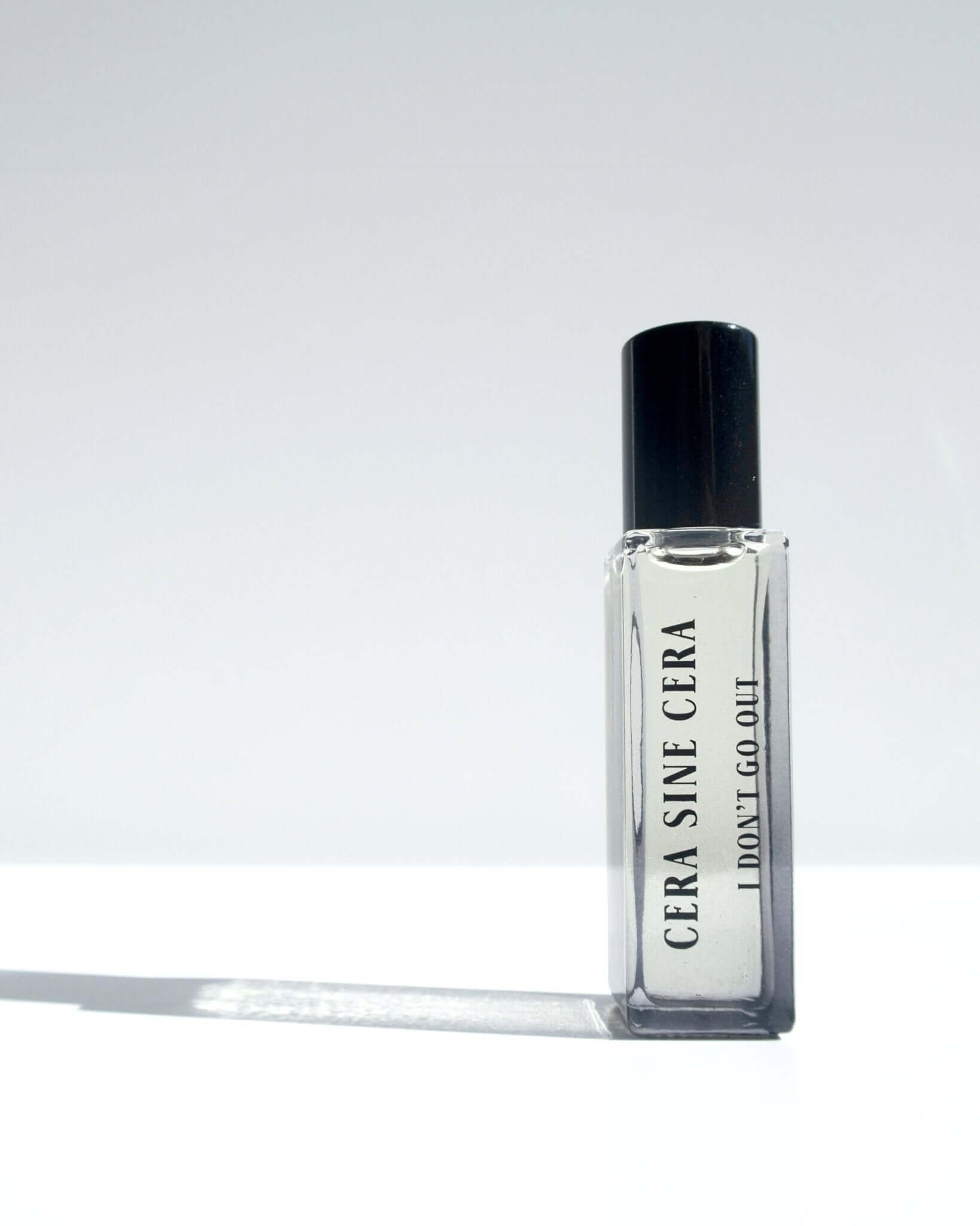 I Don't Go Out Perfume Oil - 10ml roll-on portable size by Cera Sine Cera, fragrance Nutmeg/Iris/Cedar for a Spicy Floral Earthy scent. Non-alcoholic, non-toxic, Vegan, and cruelty free.