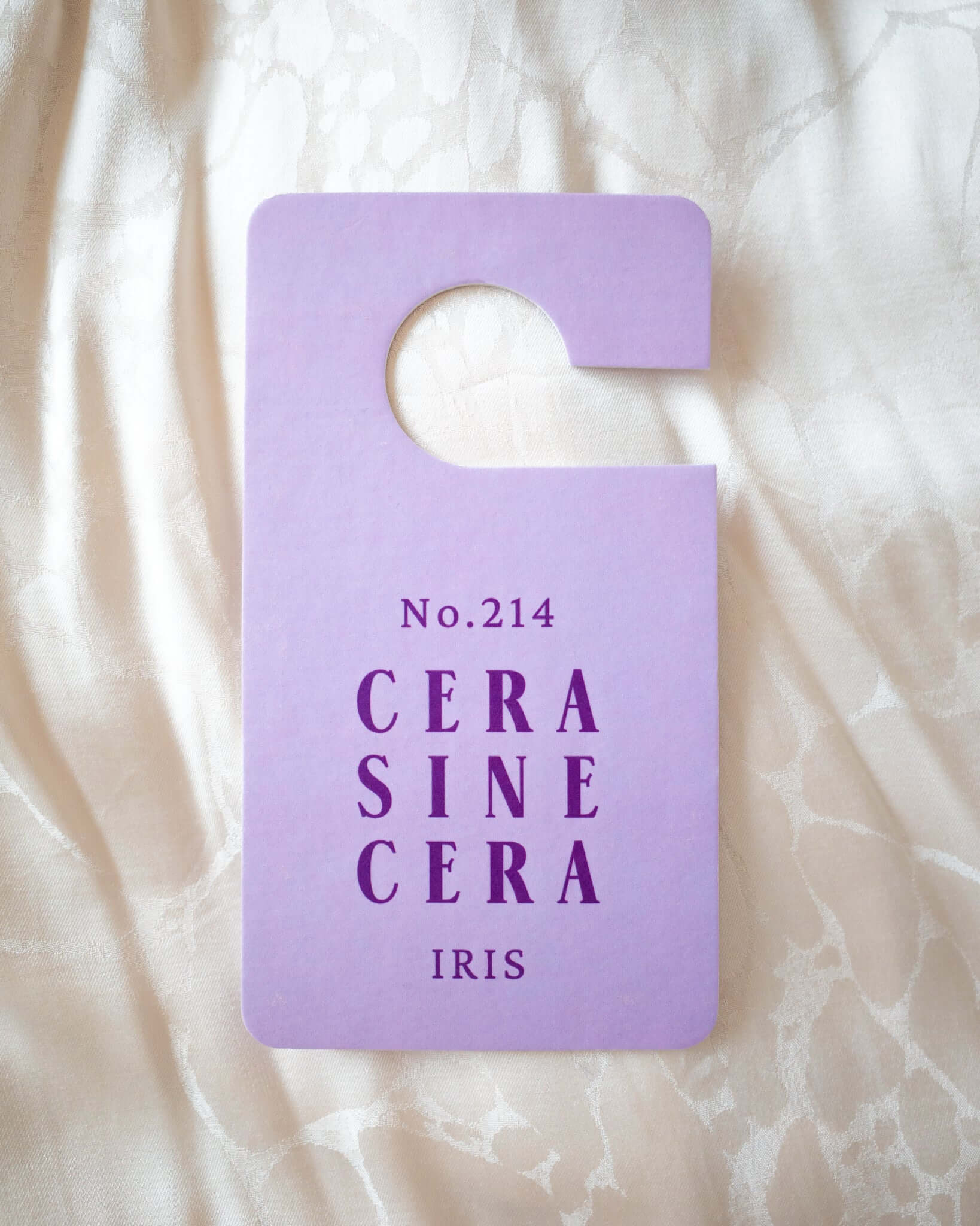 Indulge in luxury with our No.214 Fragrance Tag. This exquisite tag exudes the captivating scent of Iris, adding a touch of elegance to any space. Simply hang it or place it anywhere for the alluring fragrance. Elevate your sensory experience with our Fra