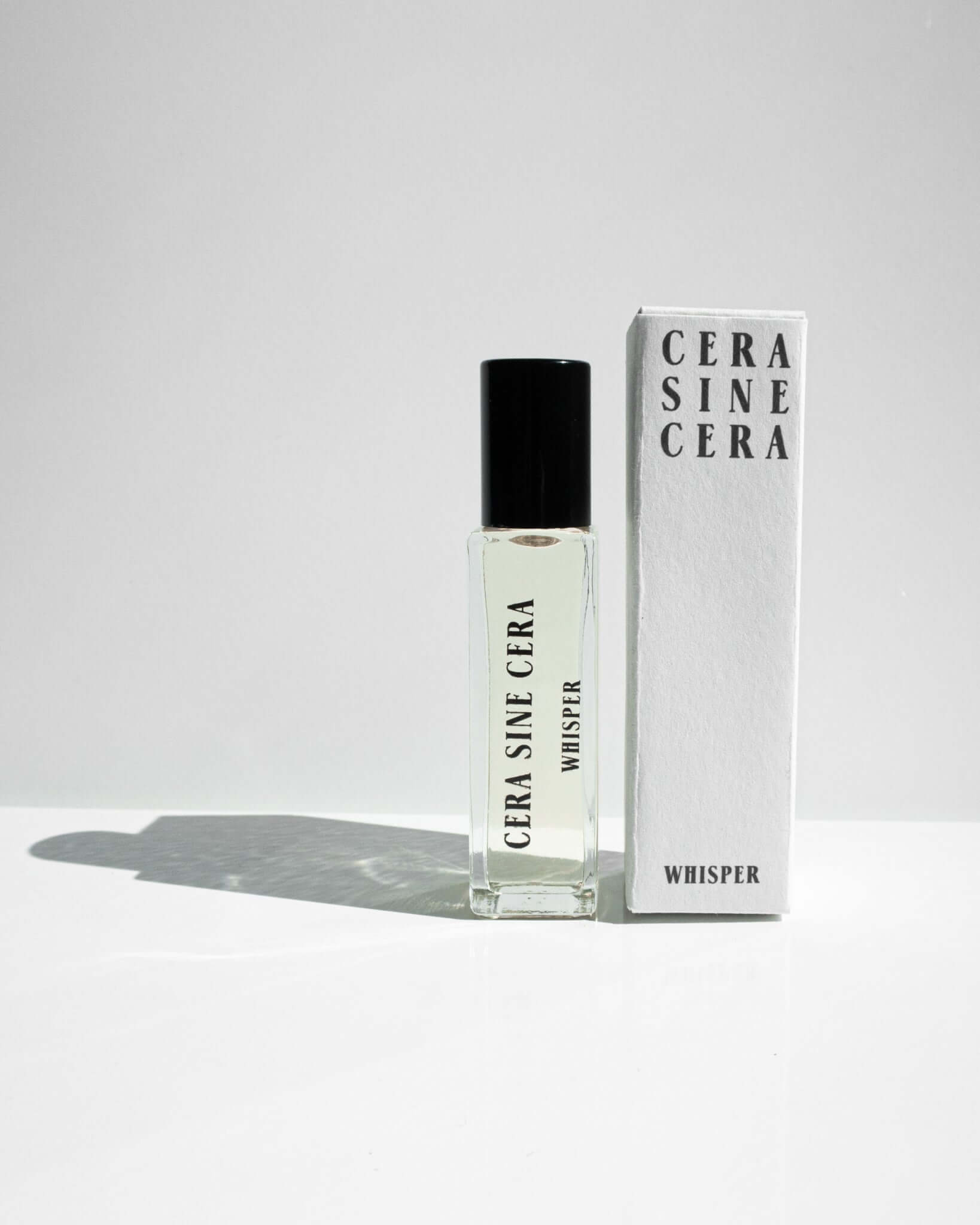 Whisper Perfume Oil - 10ml roll-on by Cera Sine Cera, fragrance notes of Orange Blossom/Jasmine/Bourbon Vanilla. Scent of Floral Creamy Warm. Non-alcoholic, non-toxic, Vegan, and cruelty free.